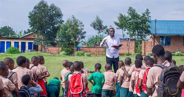 Man teaching to a class